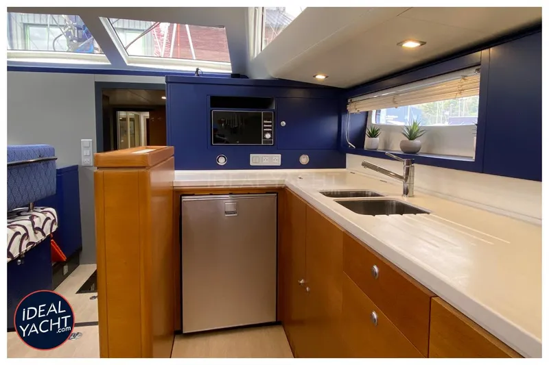 Mary Blue 3 Yacht Photos Pics Luxurious yacht kitchen with modern appliances, sleek countertops, and natural light. Garcia 65ft Aluminium Centerboard, 2008.