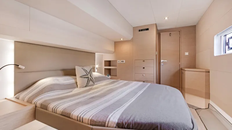 A New Hope Yacht Photos Pics Luxurious bedroom interior of 2018 Fountaine Pajot MY 44 yacht with modern design.