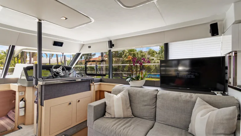 A New Hope Yacht Photos Pics Luxurious interior of 2018 Fountaine Pajot MY 44 yacht with modern decor and large windows.
