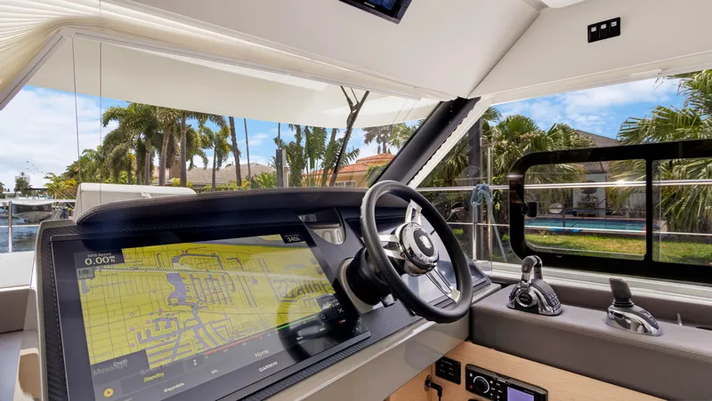 A New Hope Yacht Photos Pics 2018 Fountaine Pajot MY 44 yacht helm with navigation display and steering wheel.