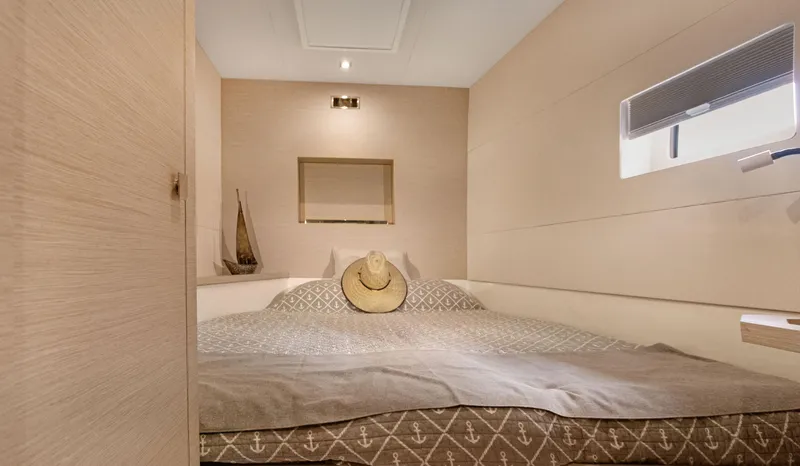 A New Hope Yacht Photos Pics Cozy bedroom in 2018 Fountaine Pajot MY 44 yacht with elegant decor and natural light.