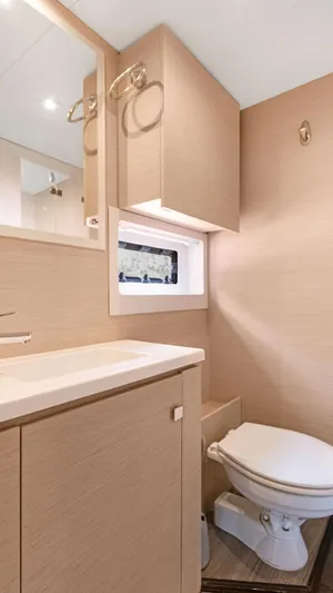 A New Hope Yacht Photos Pics Modern bathroom in 2018 Fountaine Pajot MY 44 yacht with sleek cabinetry and compact design.