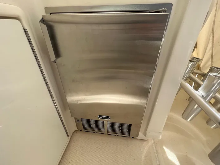 Chaos Yacht Photos Pics Stainless steel refrigerator on 1996 Tiara Yachts 4300 Open boat.