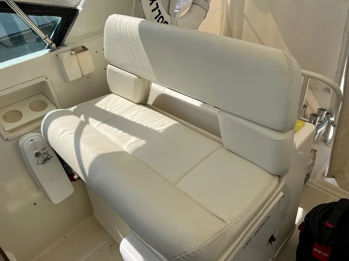 Chaos Yacht Photos Pics White leather seating on 1996 Tiara Yachts 4300 Open boat.