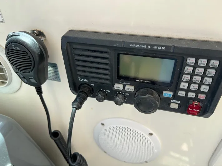 Chaos Yacht Photos Pics VHF marine radio on 1996 Tiara Yachts 4300 Open, featuring Icom IC-M602 model.