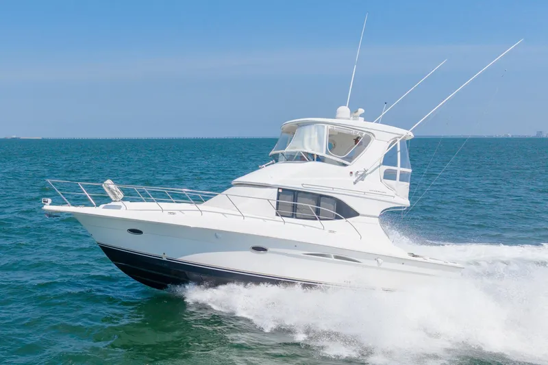 Sea Marie Yacht Photos Pics 2007 Silverton 38 Convertible yacht cruising on open water.