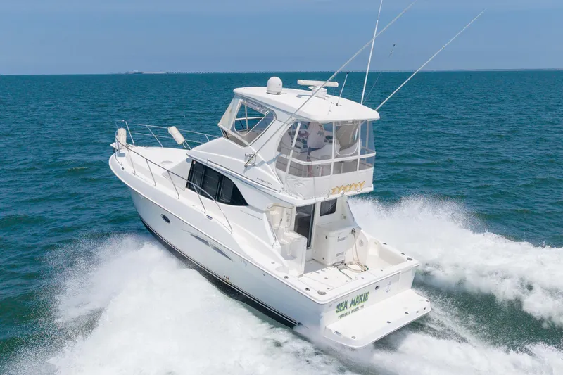 Sea Marie Yacht Photos Pics 2007 Silverton 38 Convertible yacht cruising on open sea.