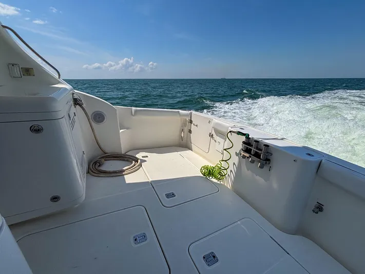 Sea Marie Yacht Photos Pics 2007 Silverton 38 Convertible boat deck with ocean view and clear sky.