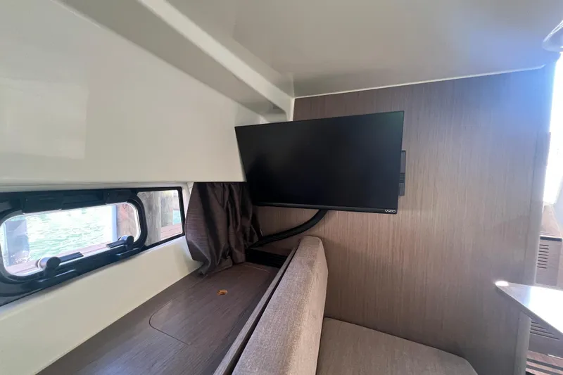  Yacht Photos Pics Interior of 2024 Beneteau Flyer 9 SUNdeck with TV and window view.
