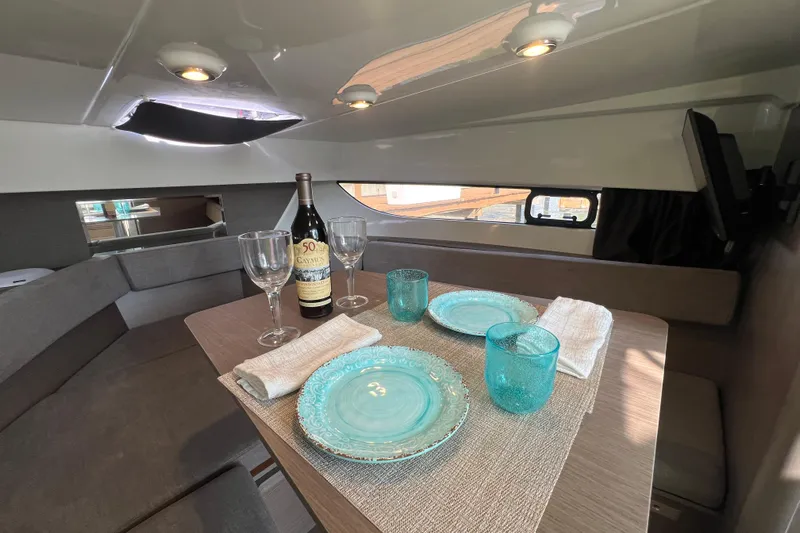  Yacht Photos Pics Interior of 2024 Beneteau Flyer 9 SUNdeck with elegant dining setup.