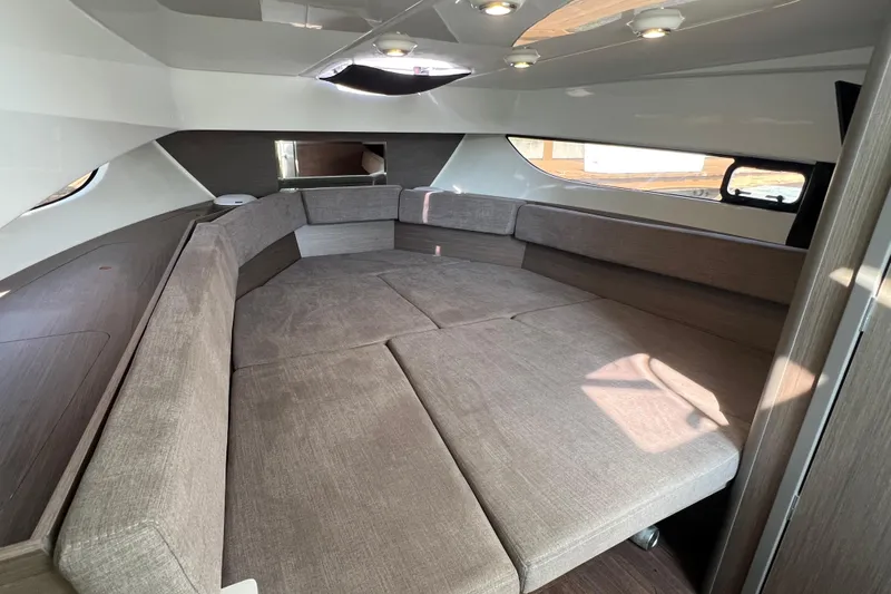  Yacht Photos Pics 2024 Beneteau Flyer 9 SUNdeck cabin interior with spacious seating and modern design.