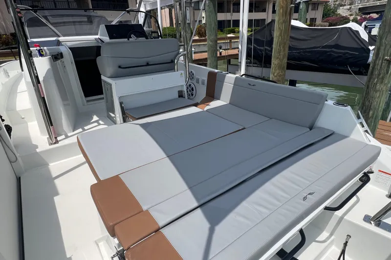  Yacht Photos Pics 2024 Beneteau Flyer 9 SUNdeck boat interior with spacious seating and modern design.