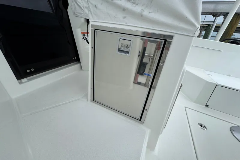  Yacht Photos Pics 2024 Beneteau Flyer 9 SUNdeck interior detail, featuring sleek white cabinetry and modern design.