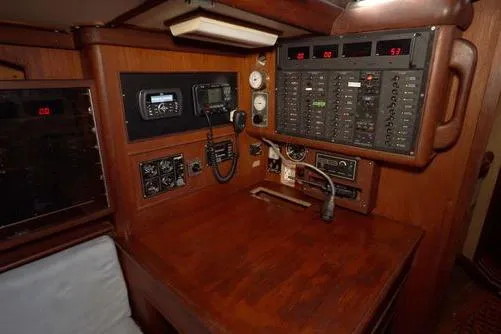  Yacht Photos Pics 1984 Little Harbor LH44 yacht navigation station with control panels and communication equipment.