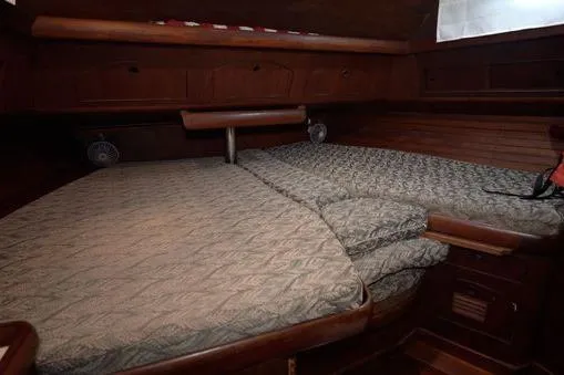  Yacht Photos Pics 1984 Little Harbor LH44 yacht cabin with cozy twin beds and wooden interior.