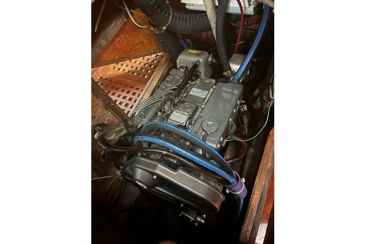  Yacht Photos Pics Engine compartment of a 1984 Little Harbor LH44 yacht, showcasing detailed mechanical components.