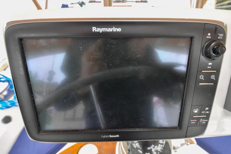 Jezebel Yacht Photos Pics Raymarine HybridTouch display on 2004 Sabre 426 yacht, featuring navigation controls.