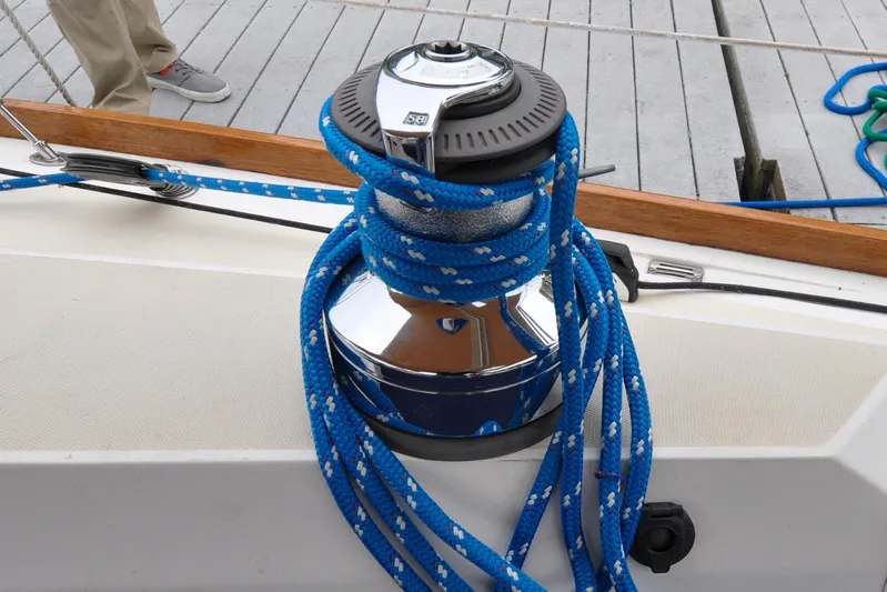 Jezebel Yacht Photos Pics Winch with blue rope on 2004 Sabre 426 sailboat deck.