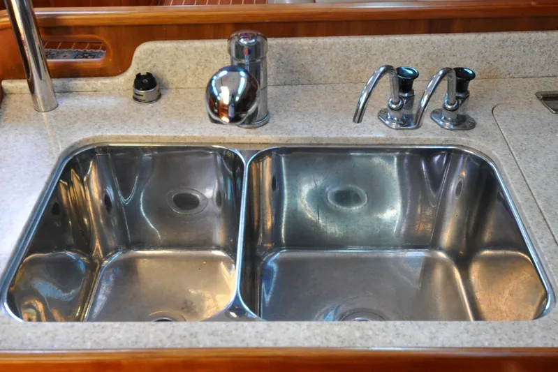 Jezebel Yacht Photos Pics Stainless steel double sink in 2004 Sabre 426 yacht kitchen.