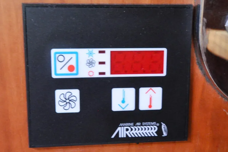 Jezebel Yacht Photos Pics Control panel of a 2004 Sabre 426 Marine Air Systems, featuring temperature and fan settings.