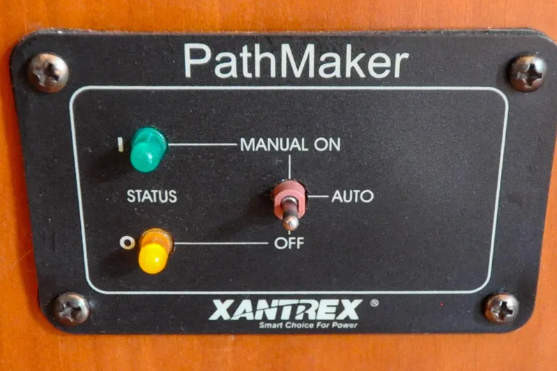 Jezebel Yacht Photos Pics PathMaker control panel with manual, auto, and status indicators on Sabre 426, 2004 model.