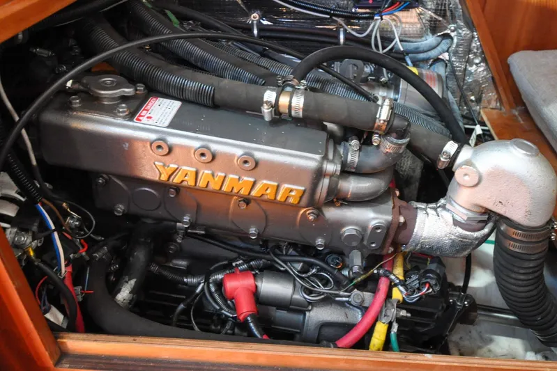 Jezebel Yacht Photos Pics Yanmar engine in 2004 Sabre 426 sailboat, showcasing detailed mechanical components.