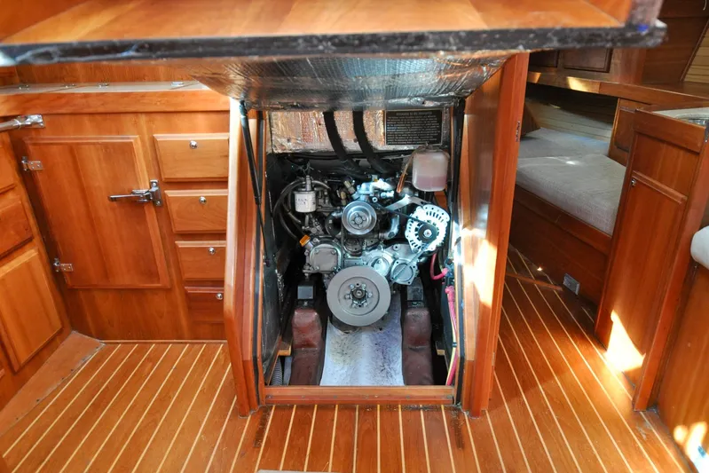 Jezebel Yacht Photos Pics Engine compartment of a 2004 Sabre 426 yacht with wooden interior detailing.