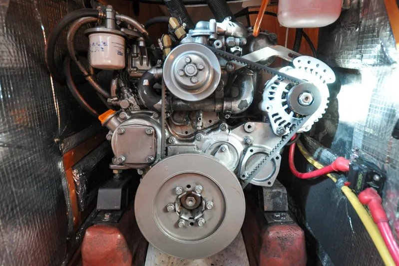 Jezebel Yacht Photos Pics Engine of a 2004 Sabre 426 boat, showcasing belts and components.