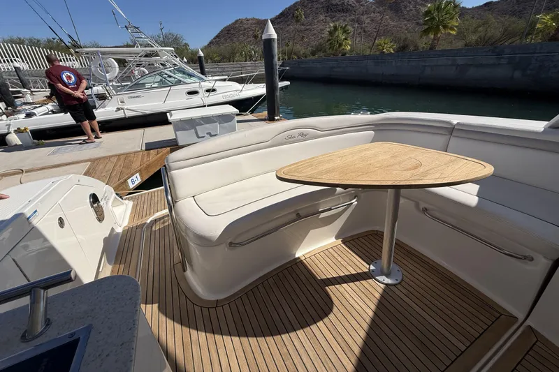  Yacht Photos Pics 2011 Sea Ray 370 Sundancer yacht with teak deck and cushioned seating area.