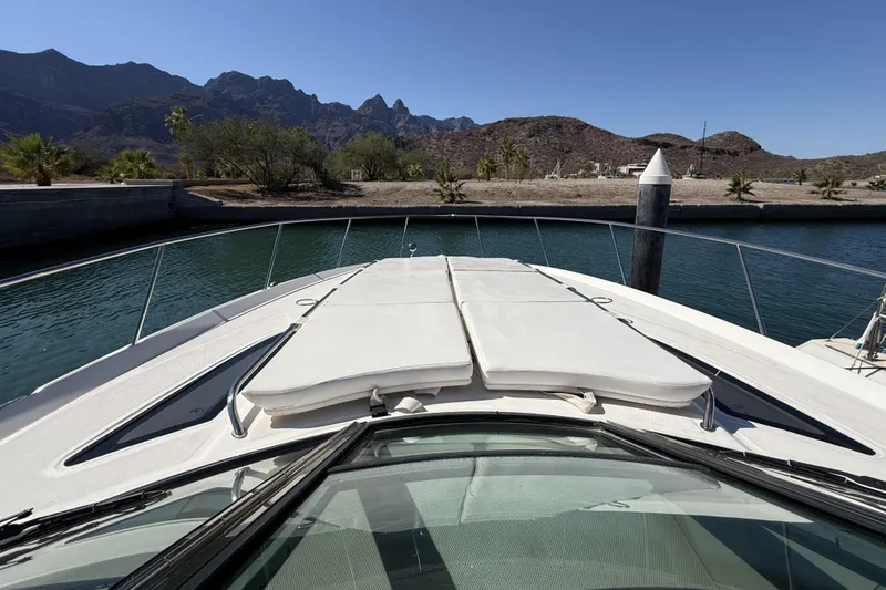  Yacht Photos Pics 2011 Sea Ray 370 Sundancer yacht with sunpads, docked in a scenic marina.