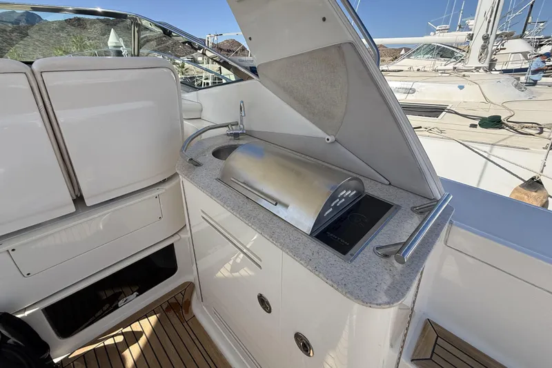  Yacht Photos Pics Outdoor kitchen on 2011 Sea Ray 370 Sundancer yacht with grill and sink.