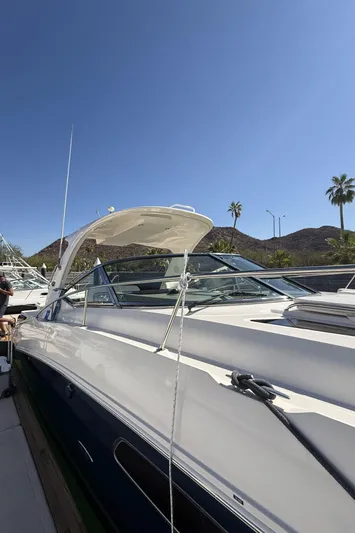  Yacht Photos Pics 2011 Sea Ray 370 Sundancer yacht docked under clear blue sky.