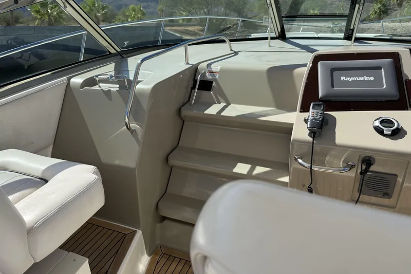  Yacht Photos Pics 2011 Sea Ray 370 Sundancer helm with Raymarine navigation system and comfortable seating.