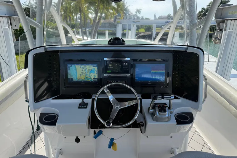  Yacht Photos Pics 2014 Nor-Tech 340 Sport Center Console helm with advanced navigation displays and controls.