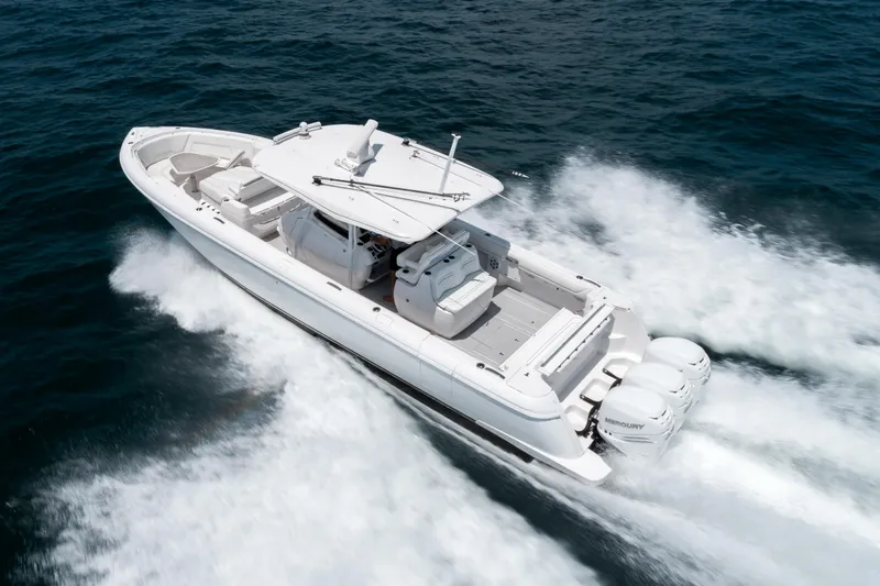  Yacht Photos Pics 2022 Intrepid 407 Nomad FE boat cruising on open water.