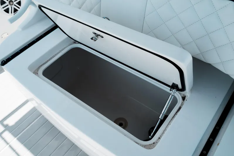  Yacht Photos Pics Open storage compartment on 2022 Intrepid 407 Nomad FE boat.