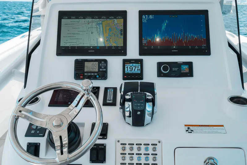  Yacht Photos Pics Dashboard of 2022 Intrepid 407 Nomad FE boat with navigation and control systems.