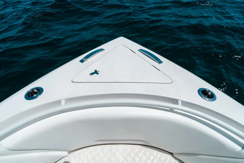  Yacht Photos Pics Bow of 2022 Intrepid 407 Nomad FE boat on open water.