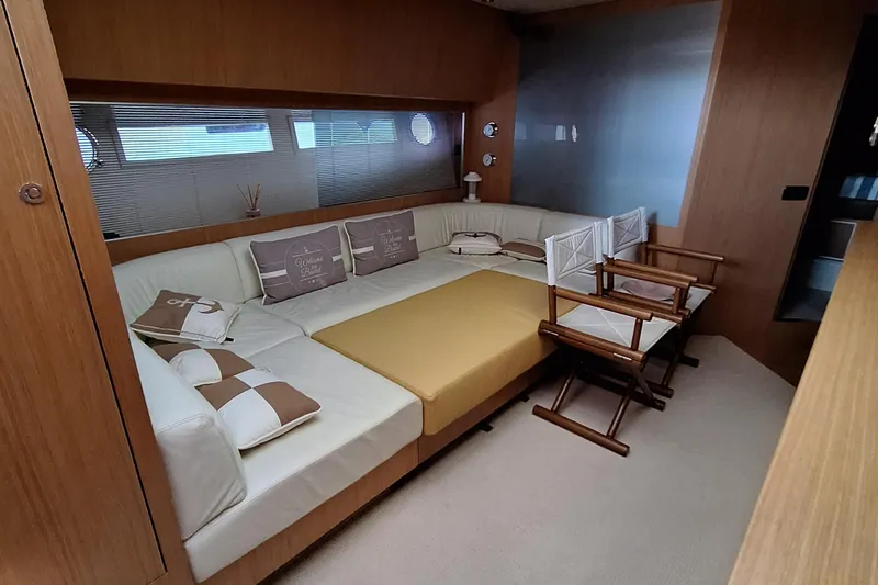 Vida II Yacht Photos Pics Luxurious interior of 2007 Riva 68 Ego yacht with elegant seating and modern decor.