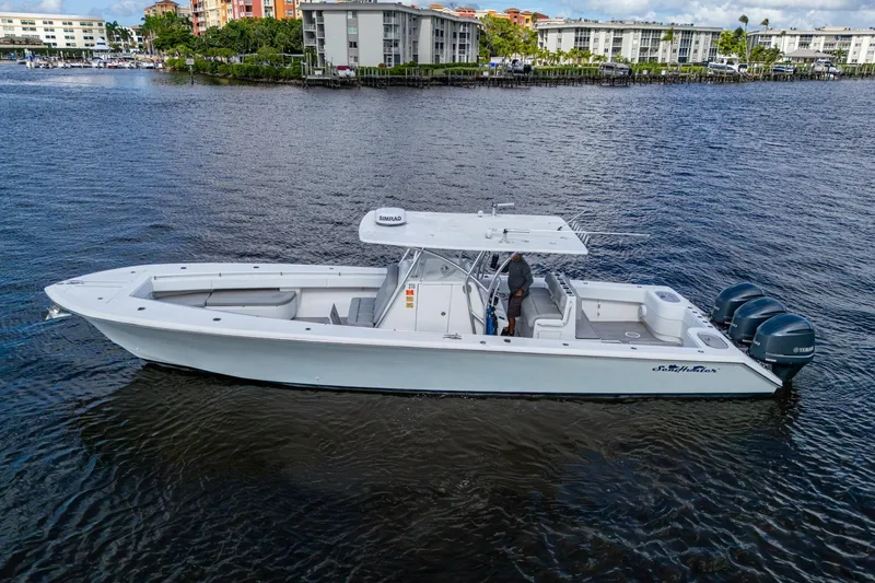  Yacht Photos Pics 2015 SeaHunter 37 Tournament boat on water, featuring triple Yamaha engines.