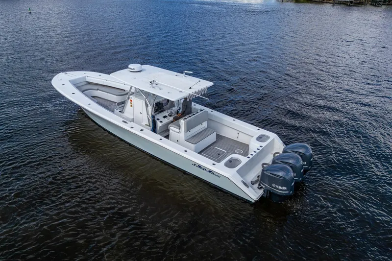  Yacht Photos Pics 2015 SeaHunter 37 Tournament boat with triple Yamaha engines on open water.