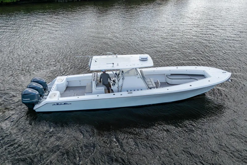  Yacht Photos Pics 2015 SeaHunter 37 Tournament boat on water, featuring triple Yamaha engines.