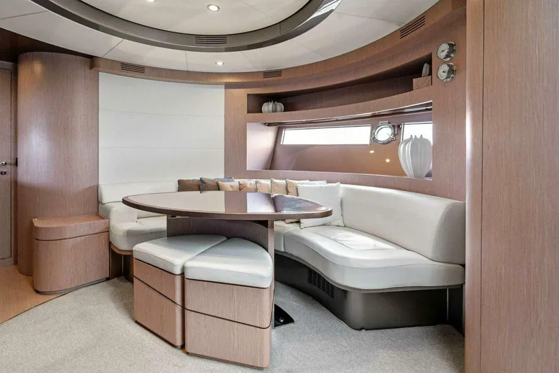  Yacht Photos Pics Luxurious interior of 2016 Riva 52' Rivale yacht with elegant seating and modern decor.