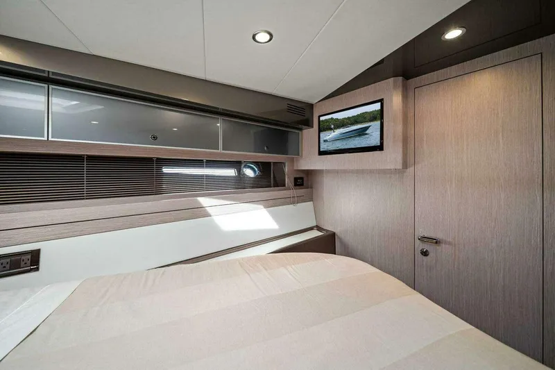  Yacht Photos Pics Luxurious interior of 2016 Riva 52' Rivale yacht cabin with modern design.