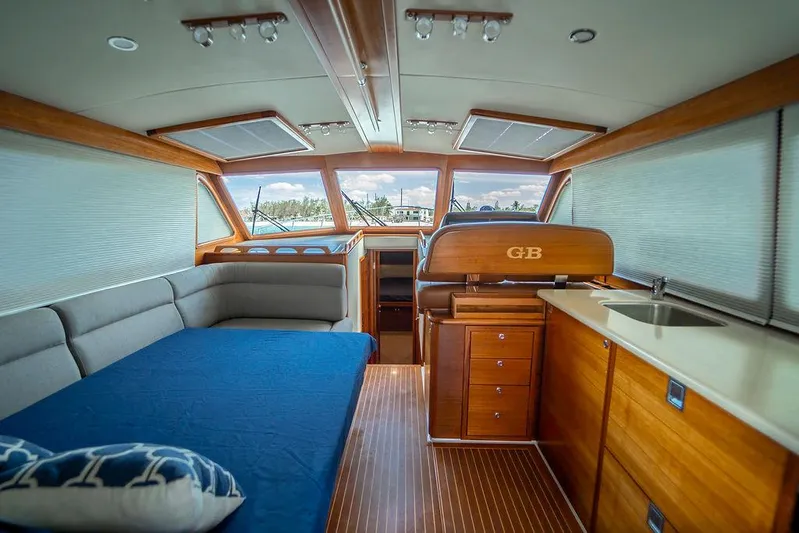 Compass Yacht Photos Pics 2020 Grand Banks 44 Eastbay SX interior with wood finish and spacious seating area.