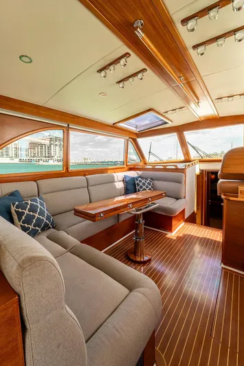 Compass Yacht Photos Pics Luxurious 2020 Grand Banks 44 Eastbay SX yacht interior with elegant wood finishes and plush seating.