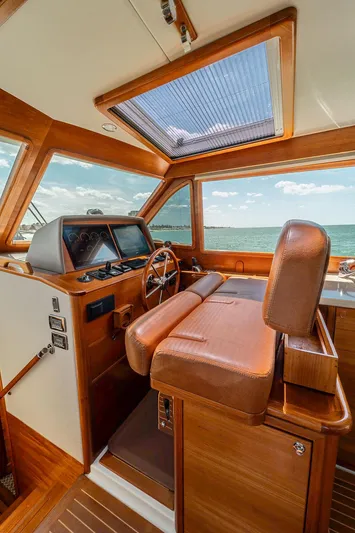 Compass Yacht Photos Pics 2020 Grand Banks 44 Eastbay SX helm with leather seating and panoramic ocean view.