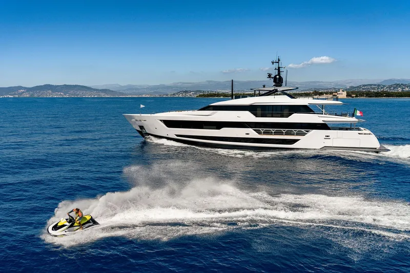 Miotu Yacht Photos Pics Luxury yacht Custom Line CL 140 cruising with jet ski nearby, 2022 model.