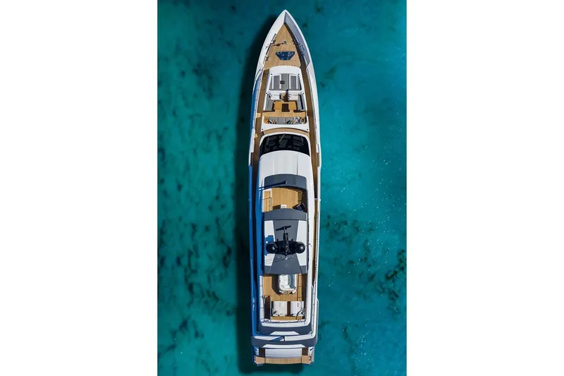 Miotu Yacht Photos Pics Aerial view of 2022 Custom Line CL 140 yacht on turquoise water.