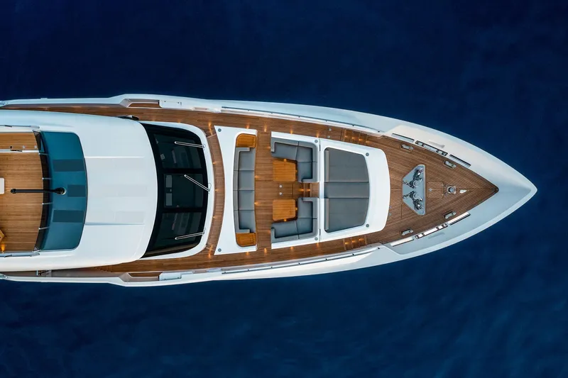 Miotu Yacht Photos Pics Overhead view of 2022 Custom Line CL 140 yacht on deep blue water.